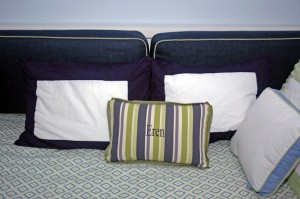 These day bed cushions provide a place for the kids to read & cuddle up with mom & dad before they go to bed. They are made from navy linen with green welting and a bottom zipper enclosure.