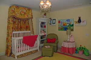 This little girls room was planned so that she can grow up in it. The crib canopy can be used over her big girl bed when she grows out of it.