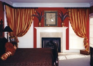 This is a romantic bedroom with a fireplace and a gorgeous mahogony bed. The drapery is lined and interlined and has a 3" bias banding along the leading edge to give some punch to this exquisite bedroom drapery.