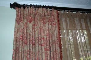 Close up of Toille panels with Goblet Pleats and Linen Sheers. Popcorn fringe along leading edge of drapery.
